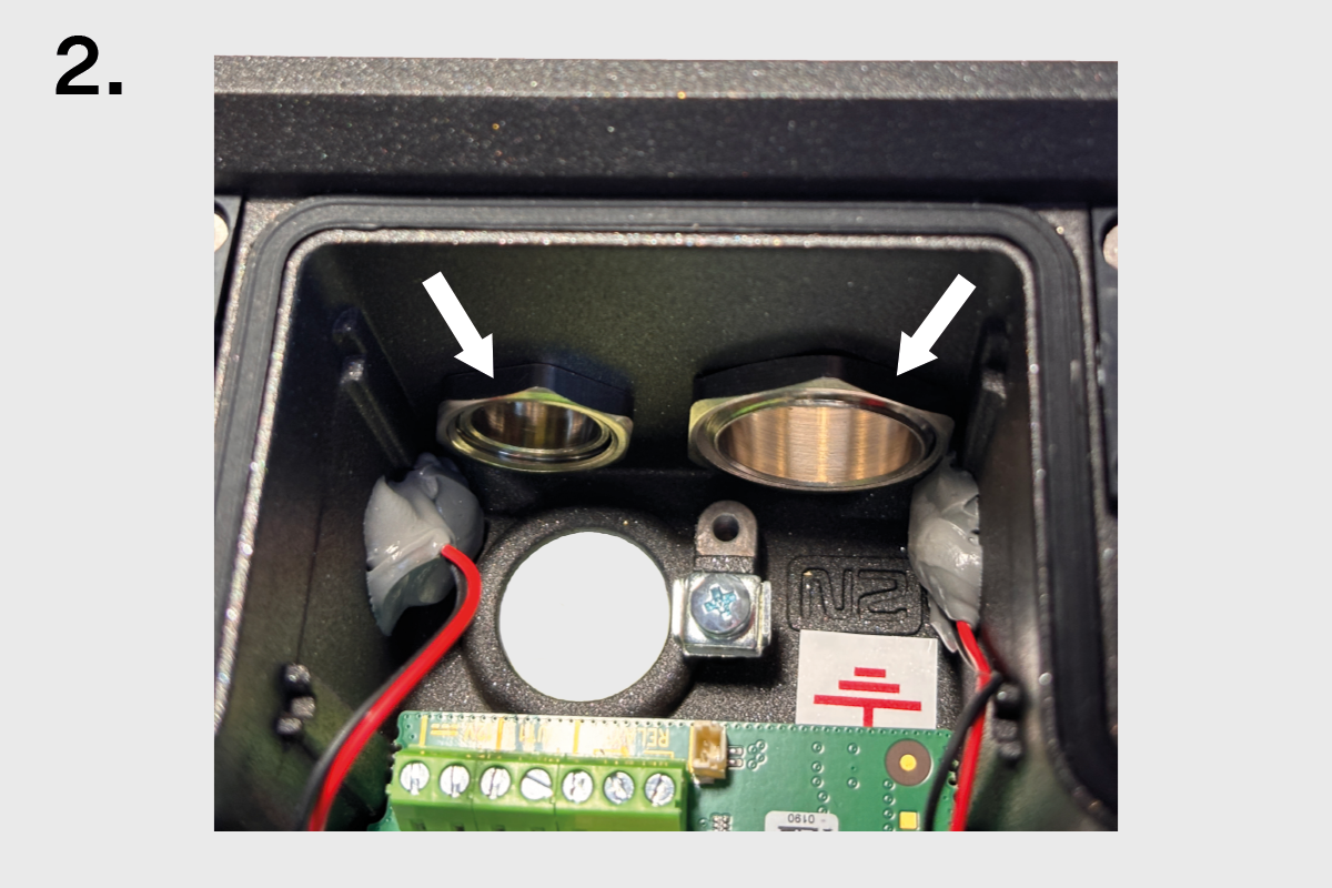 Cable Gland Pass-Through for IP Force – Internal view with mounted securing nuts inside housing