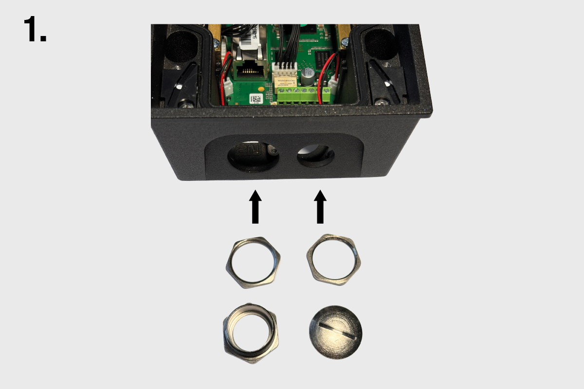 Cable Gland Pass-Through for IP Force – Bottom view showing two open cable entry ports with securing nuts